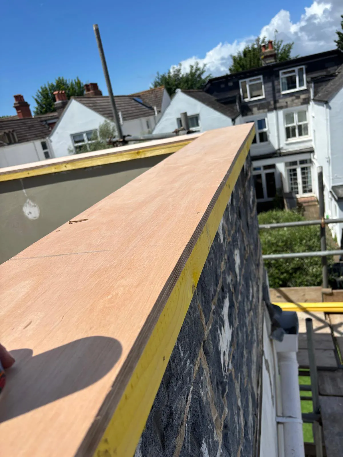 18mm marine ply fixed to the top of the balcony wall in Brighton to form a solid base for the lead capping