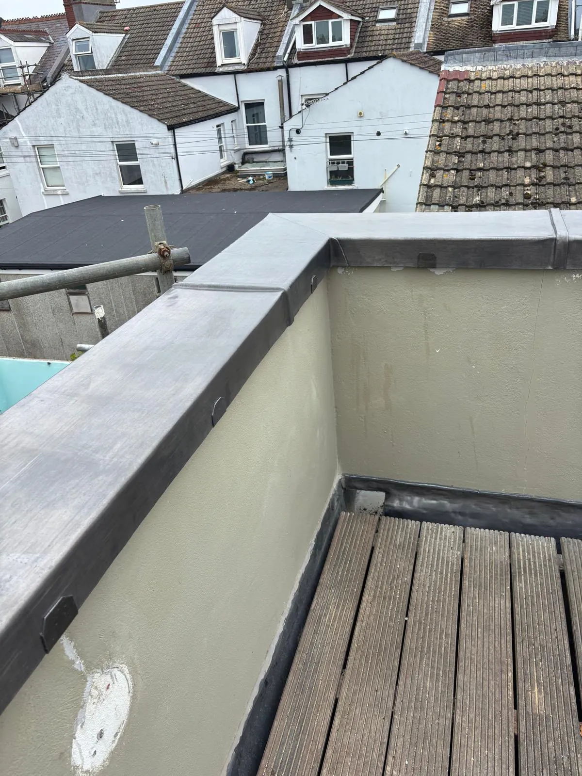 Finished fully welded lead corner on the balcony wall capping in Brighton