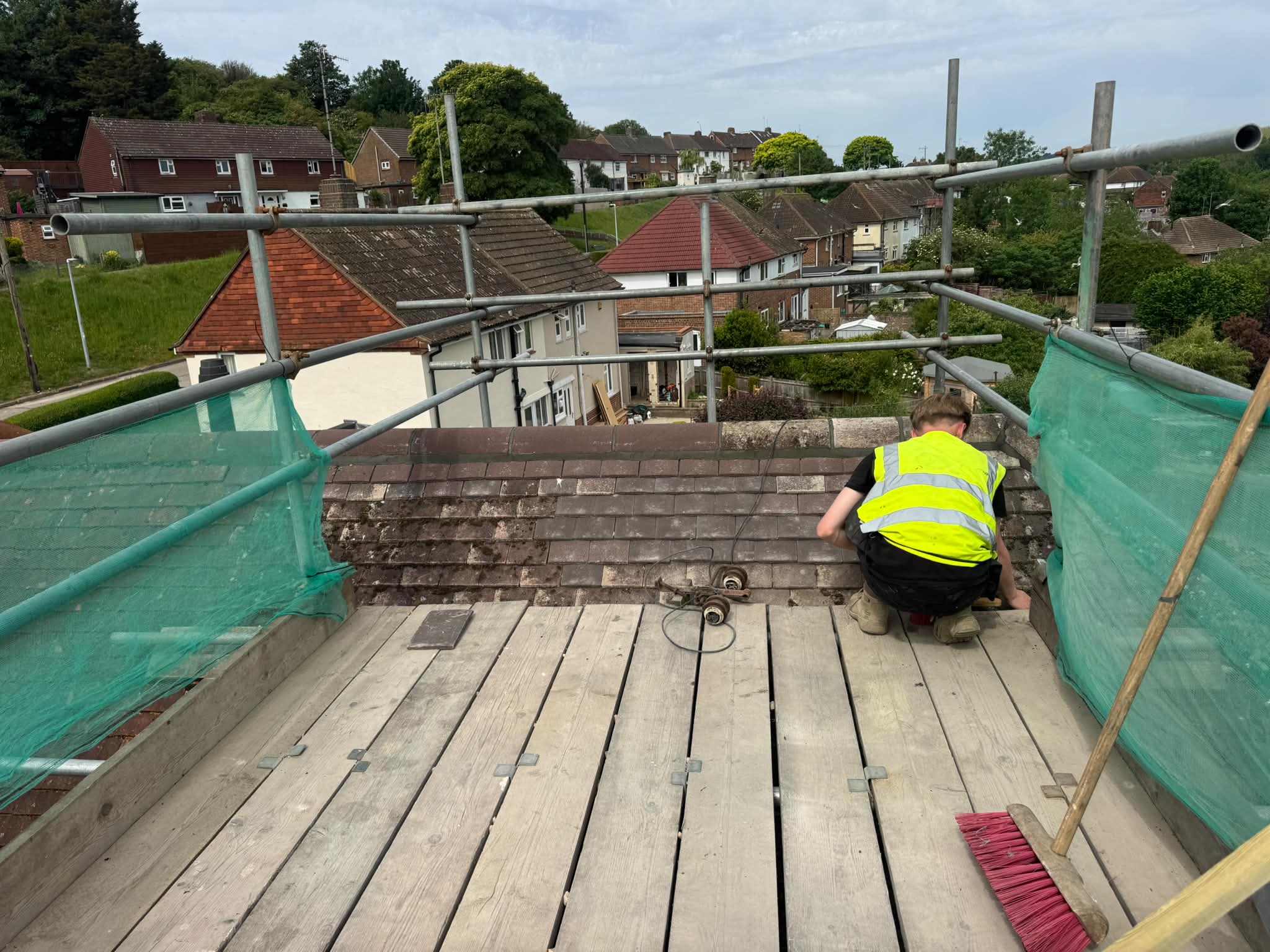 Roof re-tiling complete on Heath Hill Avenue, Bevendean — new felt and batten laid and matching tiles fixed back over the reinstated roof slope